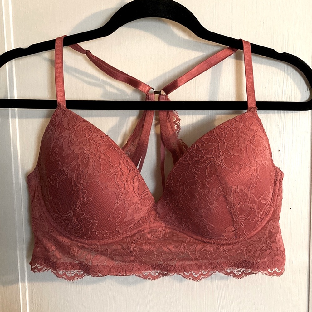 Red, lacy lingerie with cross-back straps.